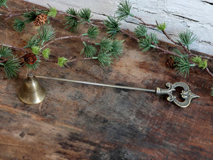 Antique brass coloured candle snuffer