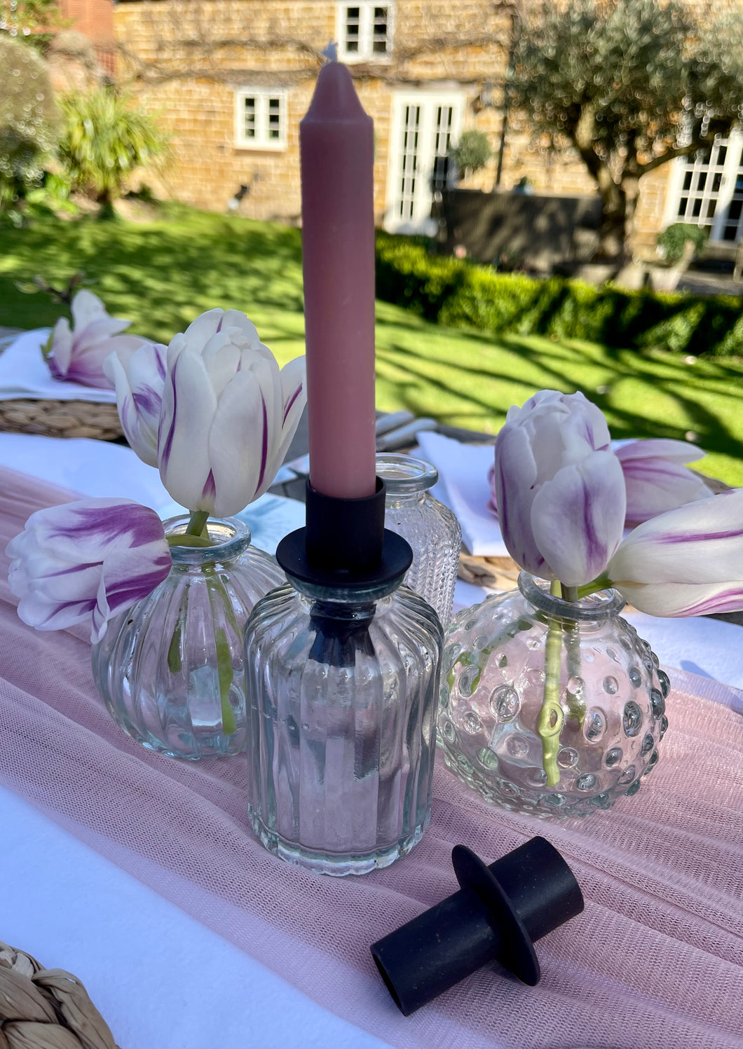 Candle holder for bottles